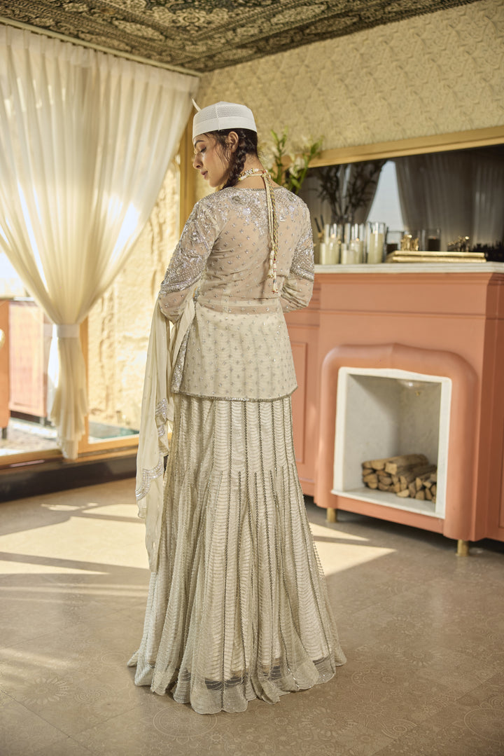 Ivory Net Lehenga with Exquisite Cut Dana & Sequin Embellishments