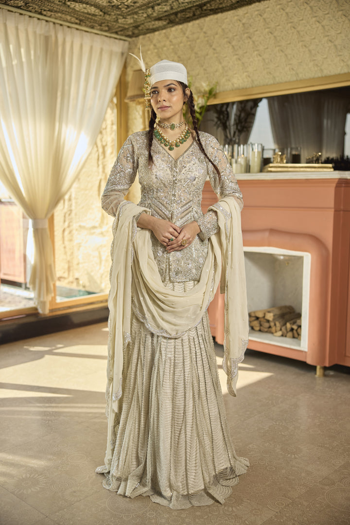 Ivory Net Lehenga with Exquisite Cut Dana & Sequin Embellishments