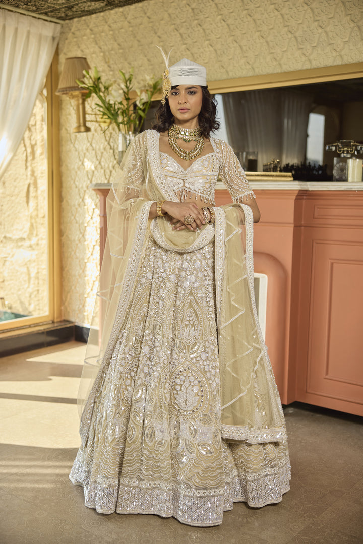 Regal Ivory Net Lehenga with Pearl & Sequin Embellishments