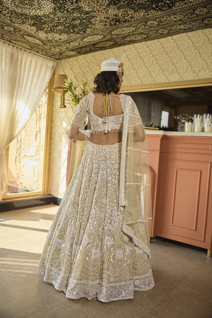 Regal Ivory Net Lehenga with Pearl & Sequin Embellishments