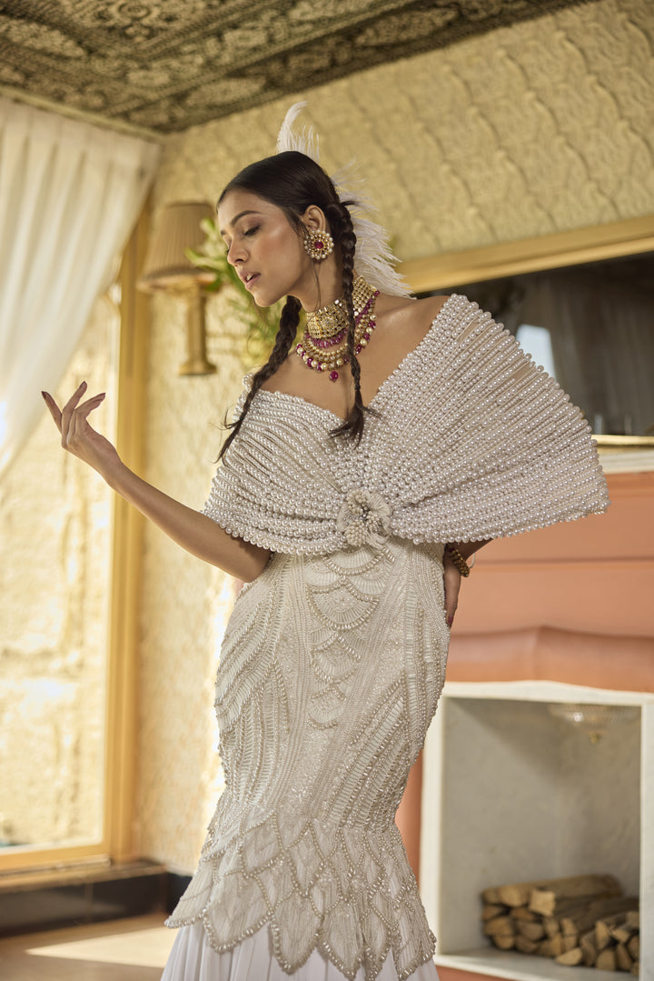 Elegant Pearl-Embellished Crepe Gown with Cape Design